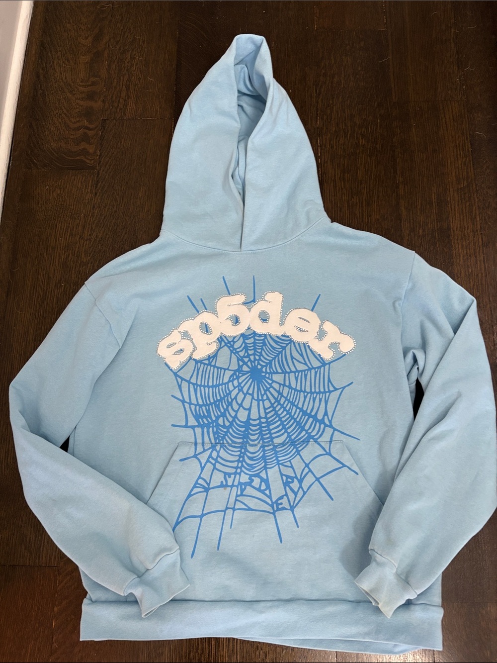 Sp5Der Men's Light Blue Crewneck Hoodie with Spider Web Graphic